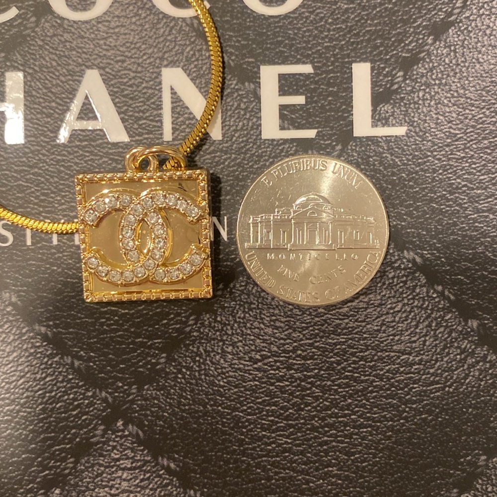CHANEL stamped Zipper Pull Pendant - Picture 9 of 9